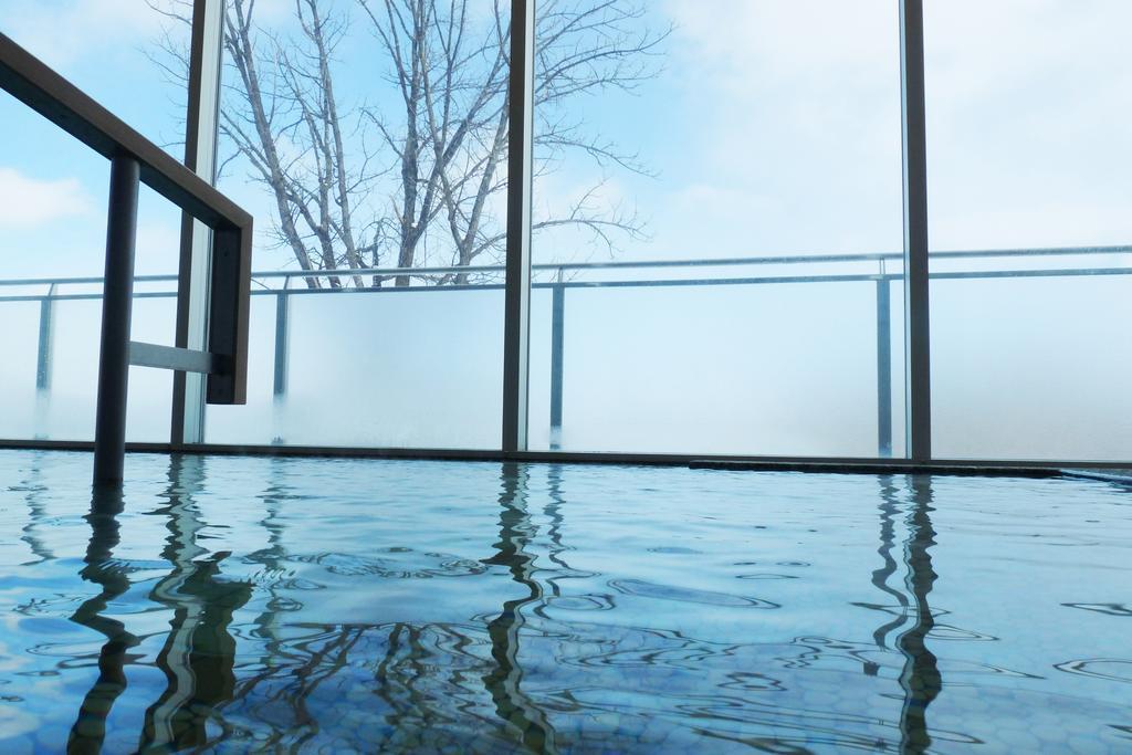Shin Furano Prince Hotel 외부 사진 A view of the indoor pool